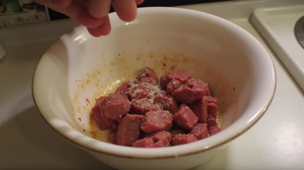 Bowl of seasoned steak pieces